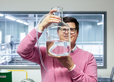 Antti Pasanen, PhD, EurGeol, Team Manager, Geological Survey of Finland (GTK), Sustainability starts where life starts – at the source Antti Pasanen, PhD, EurGeol, Team Manager, Geological Survey of Finland (GTK) with a water sample in the laboratory